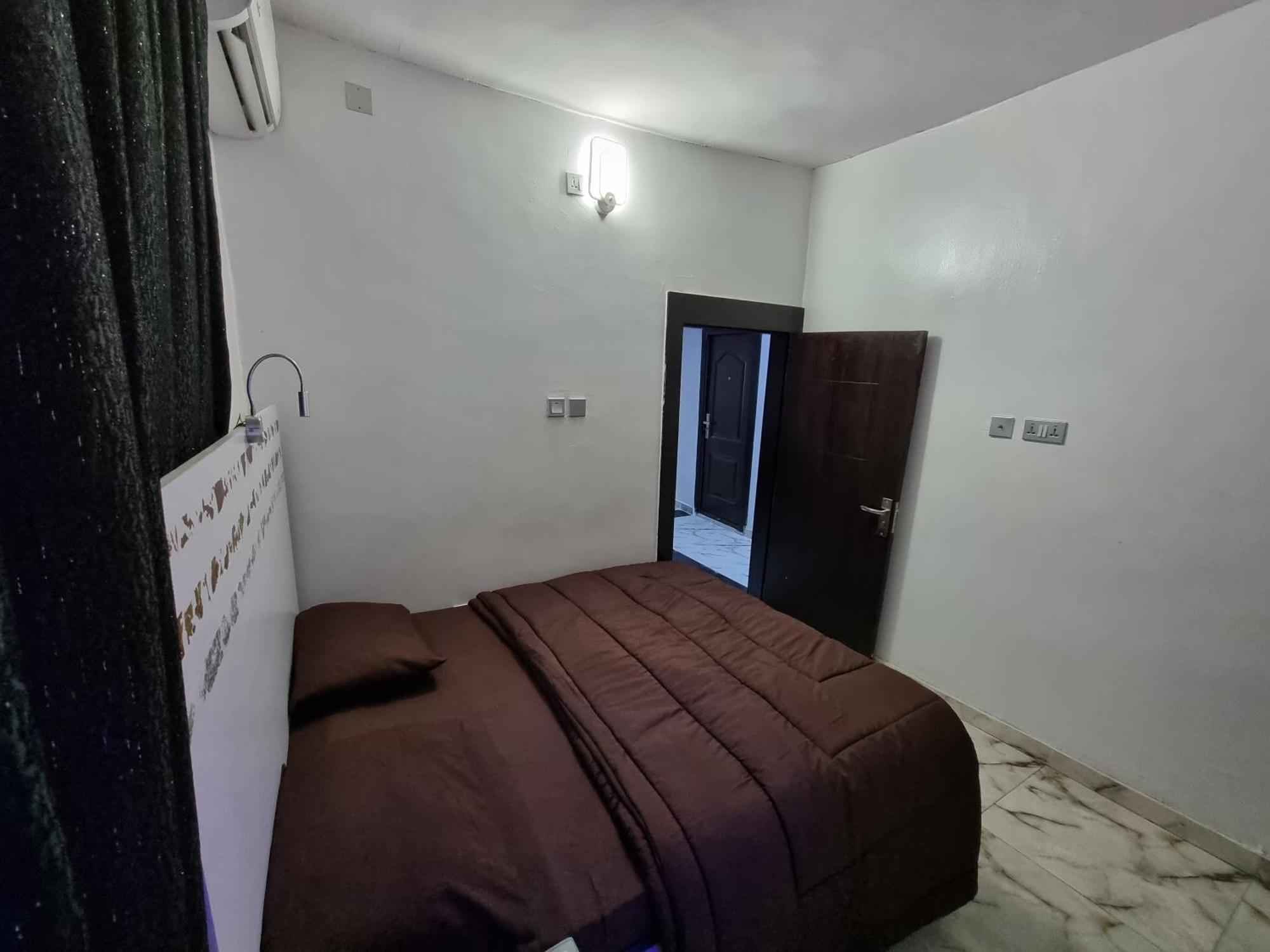 Cg Apartments Ikeja Oda fotoğraf